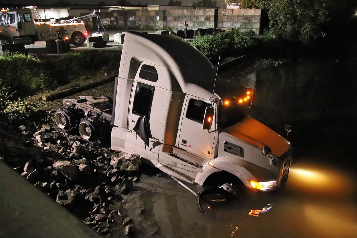 Stolen semi-truck crashes into Fraser River after high-speed chase